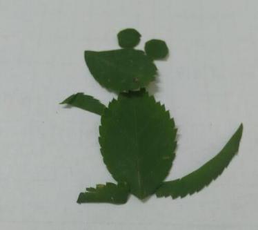 小老鼠树叶贴画制作方法