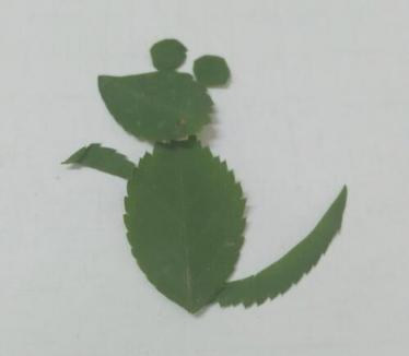 小老鼠树叶贴画制作方法